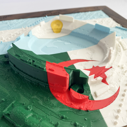 3D printed model of Arrowhead Stadium imprinted with Argentina's flag on the top half and Algeria's flag on the bottom half - encased in a solid wooden frame engraved with the text "June 26th 2026; Argentina v Algeria; Group J, Kansas City Stadium, Kansas City, MO, and coordinates"