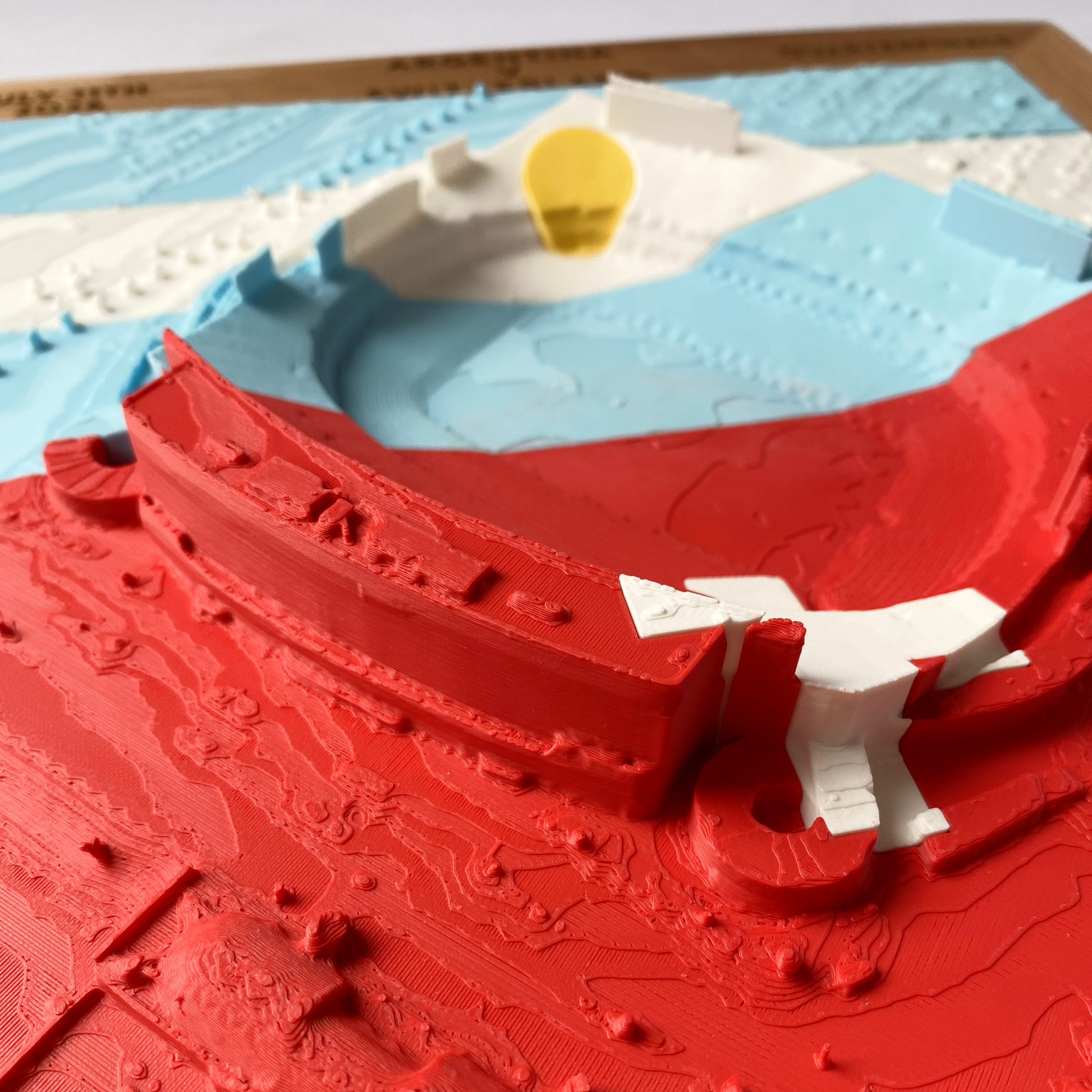 A close-up view of Arrowhead Stadium overlaid with the flag colors and designs of Argentina and Switzerland