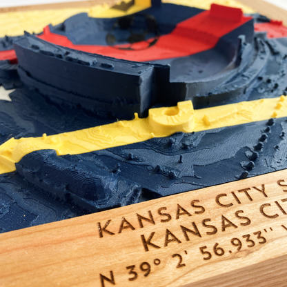 3D printed model of Arrowhead Stadium imprinted with Ecuador's flag on the top half and Curacao's flag on the bottom half - encased in a solid wooden frame engraved with the text "June 20th 2026; Ecuador v Curacao; Group E; Kansas City Stadium, Kansas City, MO, and coordinates"