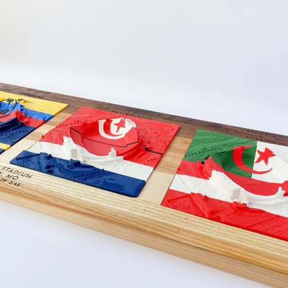 Wooden puzzle with cut-out shapes of flags on a white background