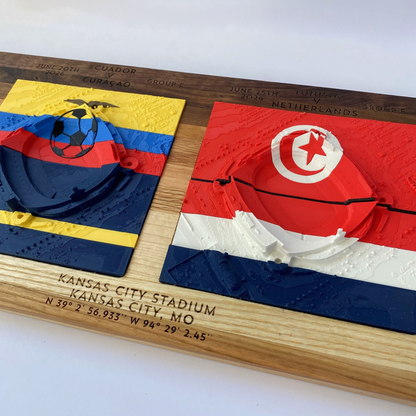 Three-dimensional cutout of colorful flags on a wooden plaque with engraved text.